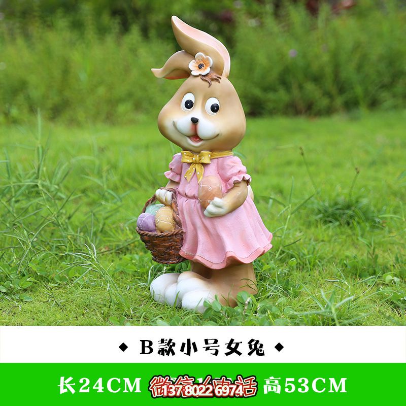 草坪一只提篮子的玻璃钢兔子雕塑